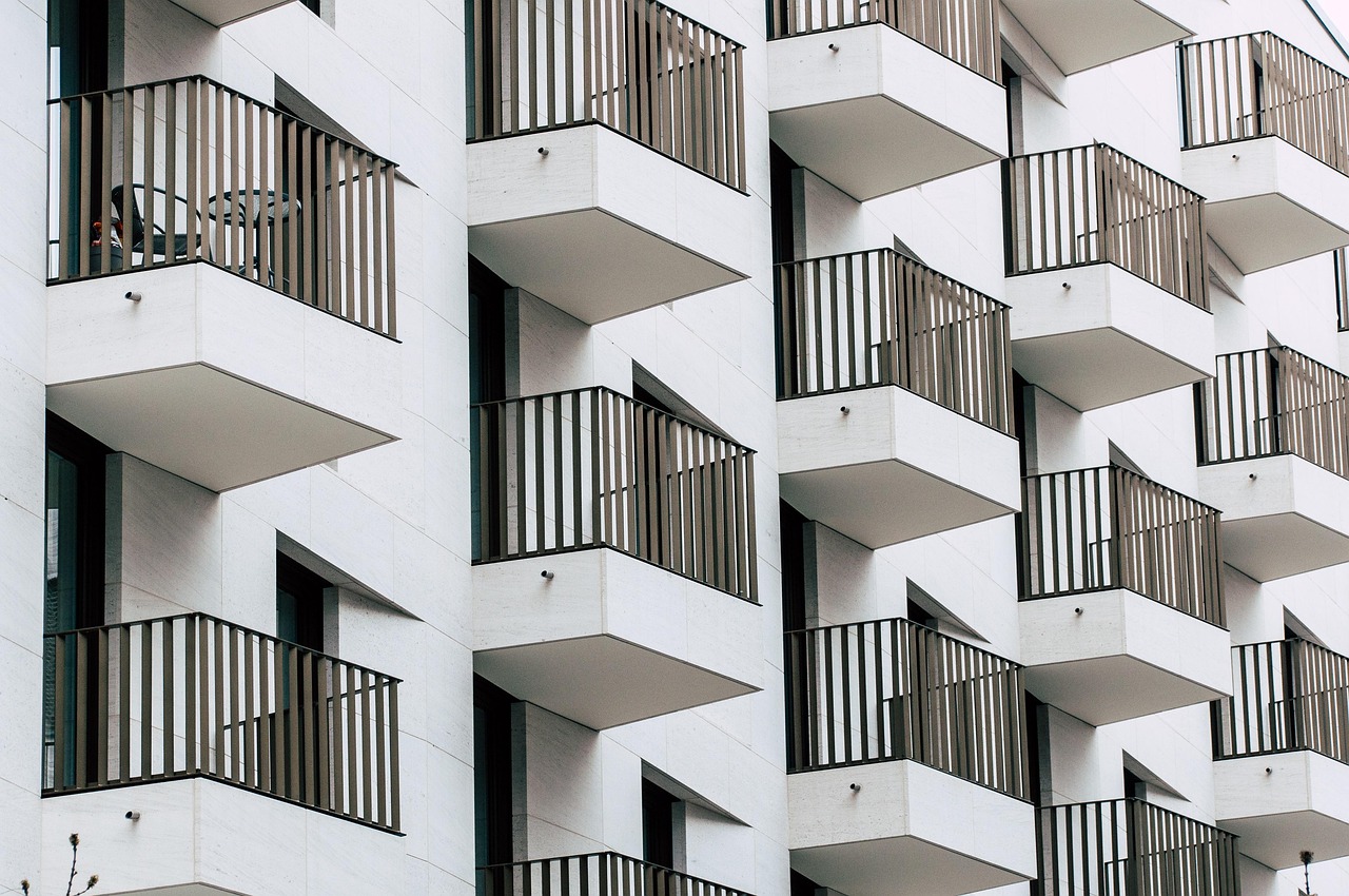 Residential apartment building with balconies showing mid-rise urban housing typical of Australian capital cities